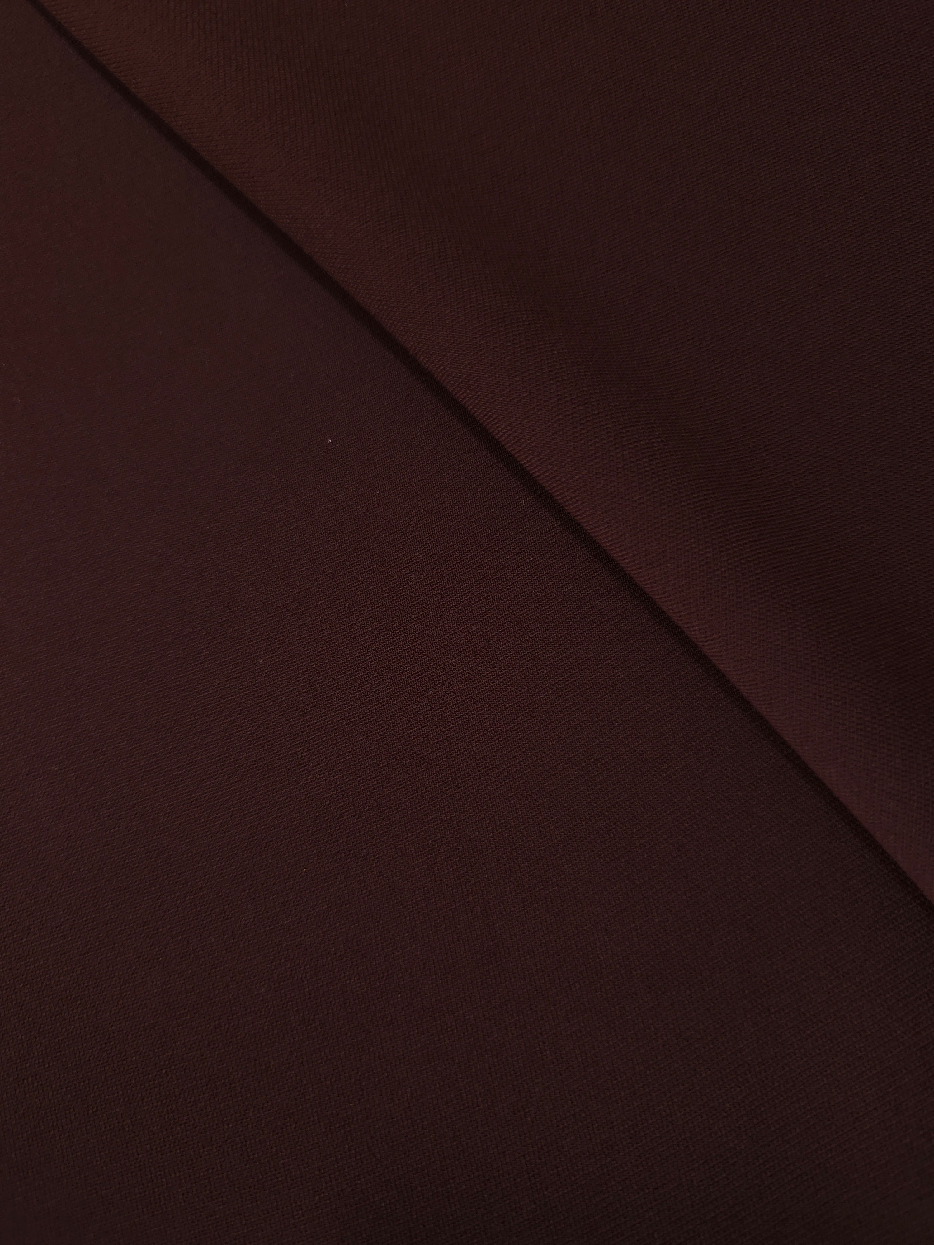 Soft-fold Mulberry Merlot Silky Italian Crepe showing fluid drape through soft folds, suited to cocktail dresses, skirts and polished separates.