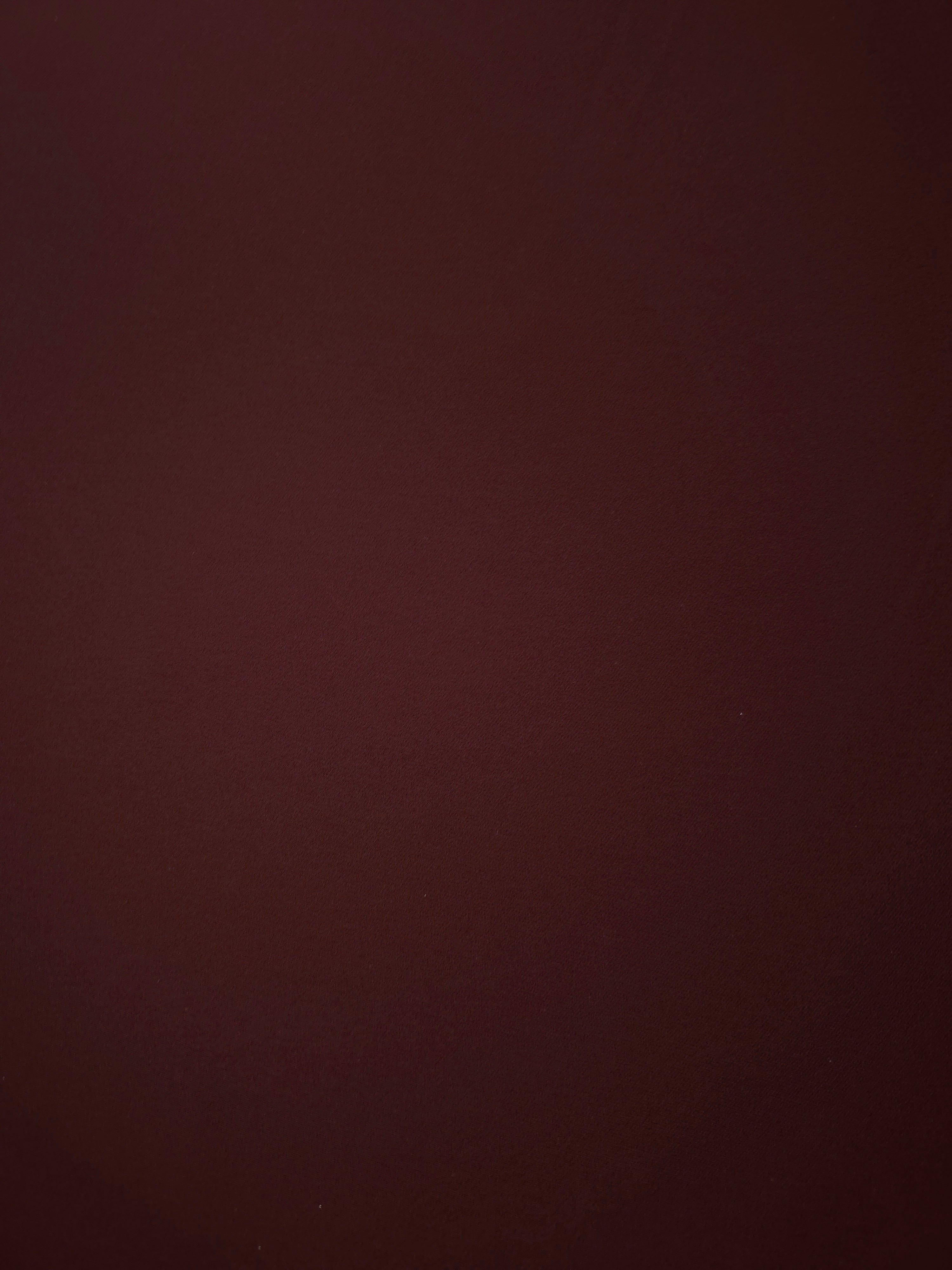 Oxblood Cocoa Silky Italian Crepe with a smooth opaque finish, suitable for cocktail dresses, skirts and polished separates.