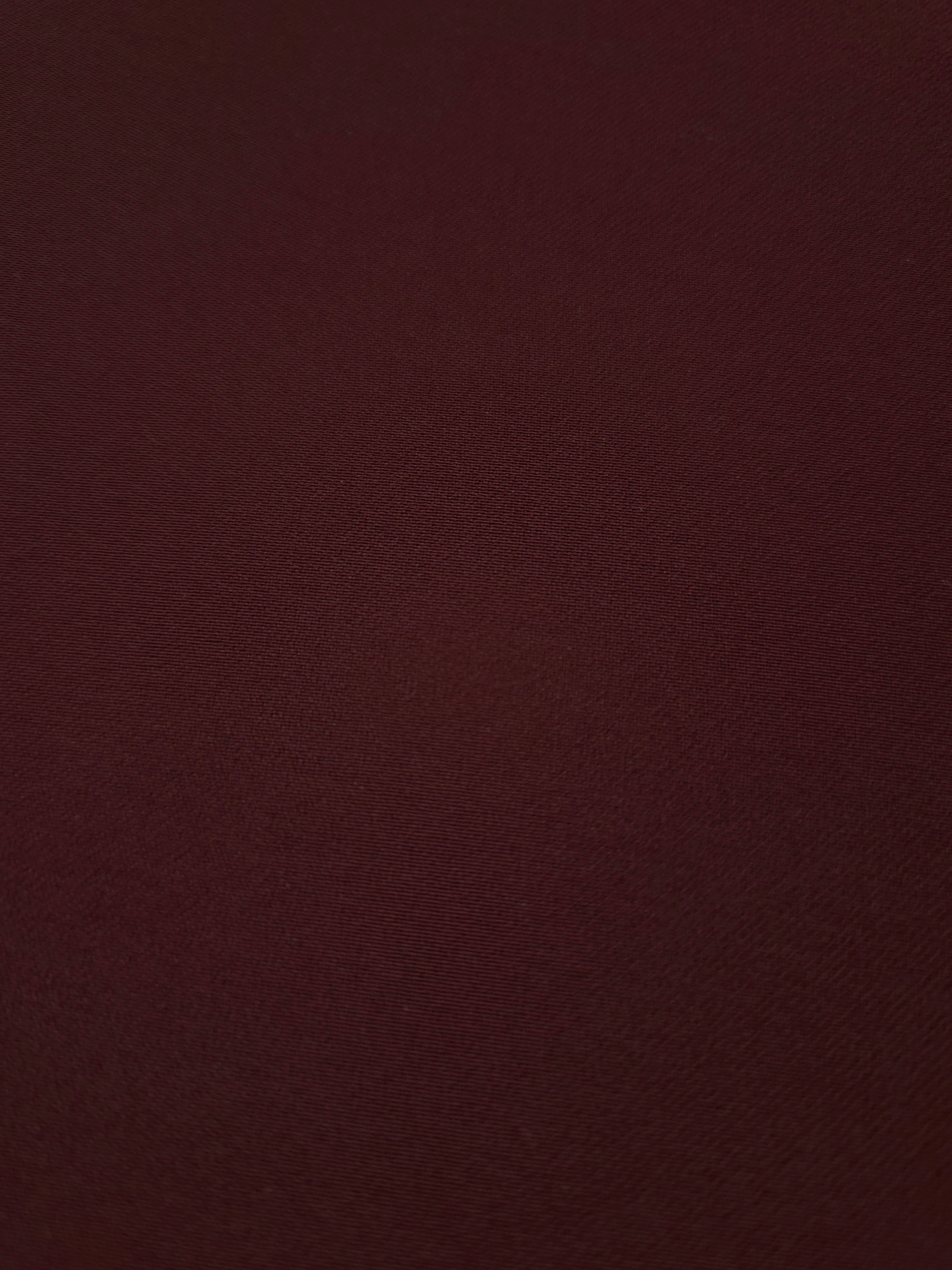 Close-up Oxblood Cocoa Silky Italian Crepe showing its fine woven texture and soft hand, ideal for occasion gowns, tunics and lightweight tailored pieces.