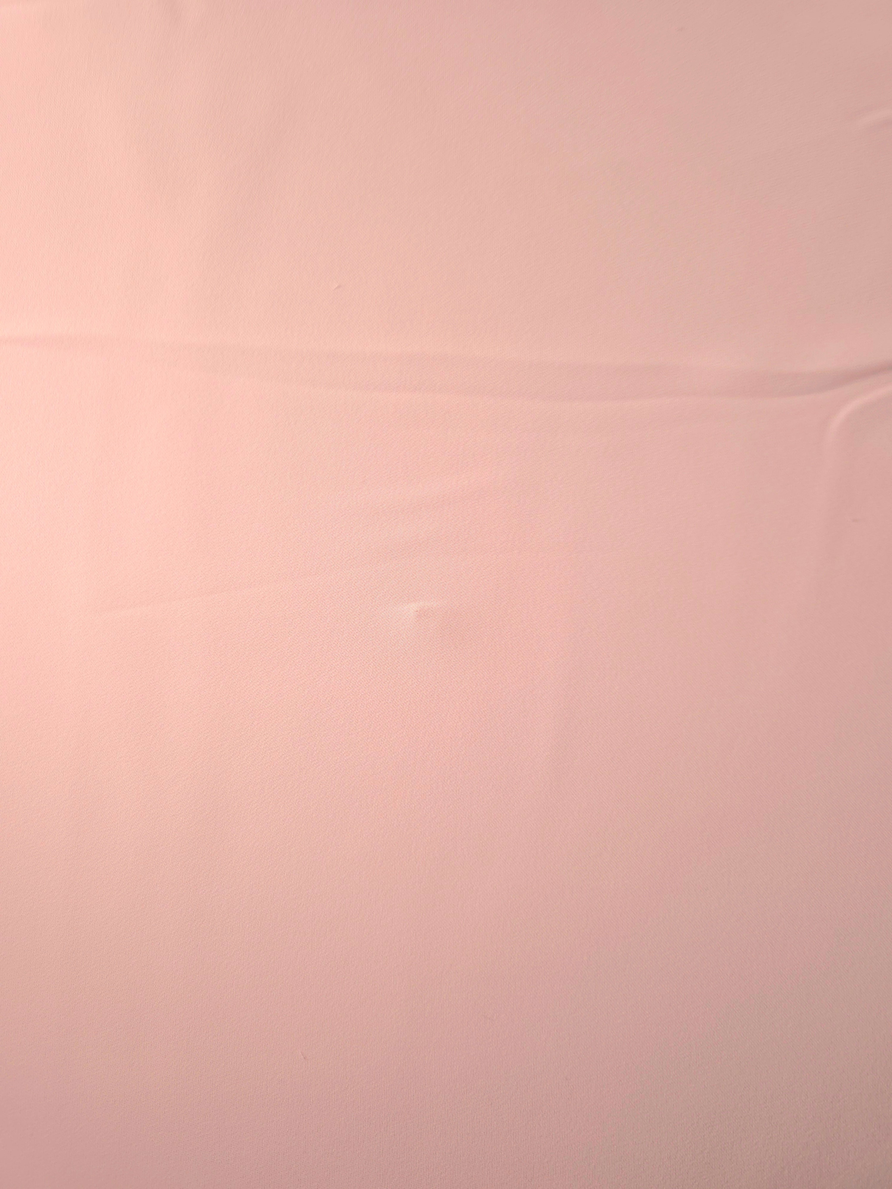 Rosewater Peach Silky Italian Crepe with a smooth opaque finish, suitable for blouses, midi skirts and modest dresses.