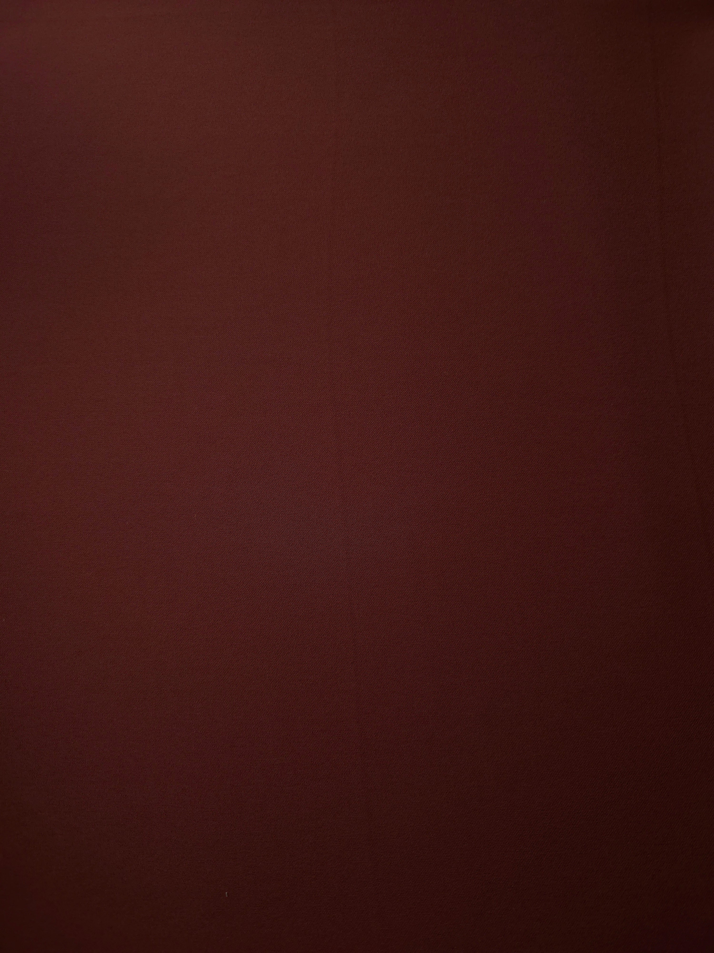Close-up Russet Mahogany Silky Italian Crepe showing its fine woven texture and soft hand, ideal for maxi dresses, modest sets and lightweight tailoring.