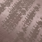 Close detail of the mauve-rose animal print colorway, warmer in tone than the taupe version