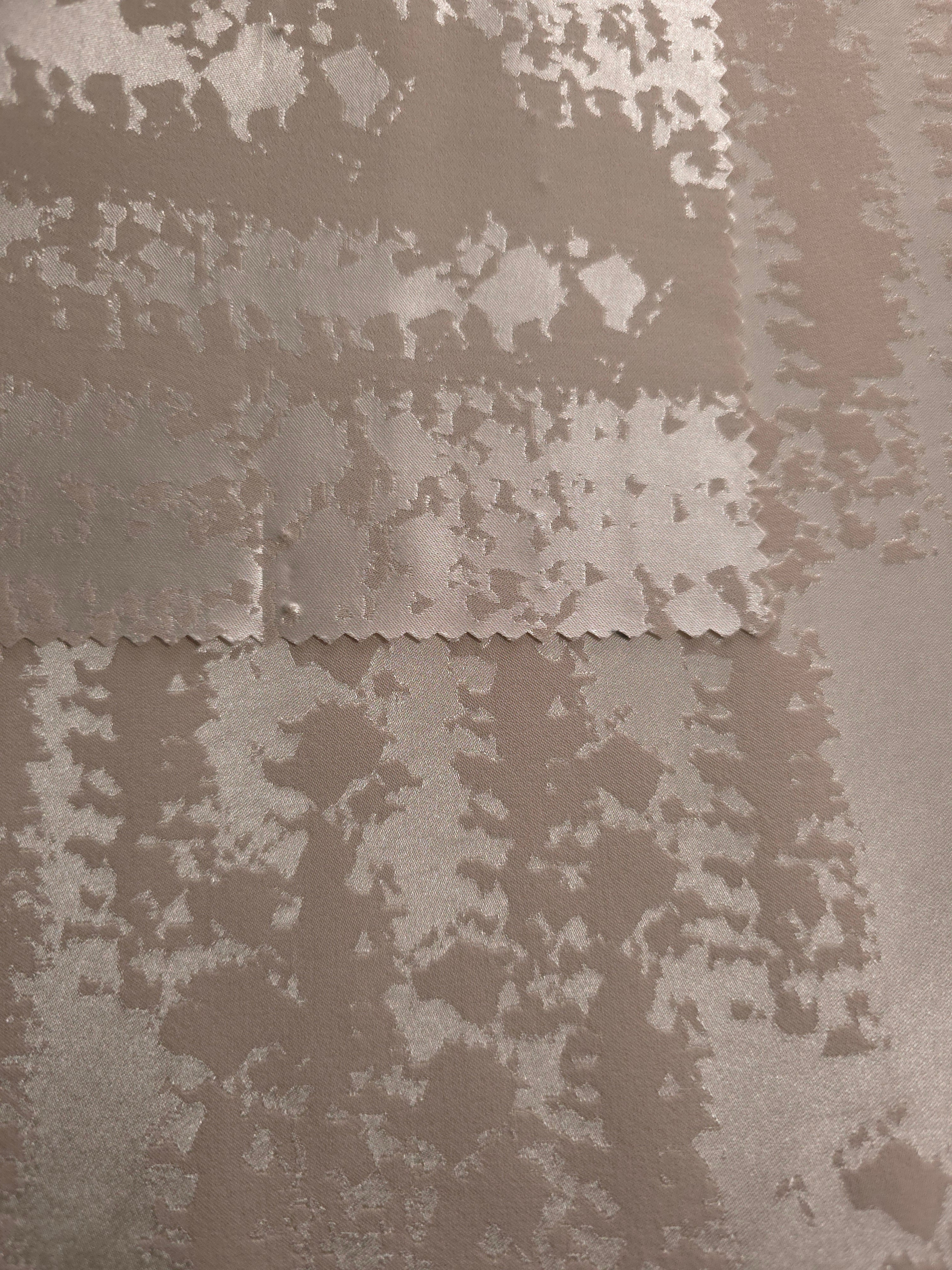 Taupe colorway shown front and back, both sides reading close in tone with a slight sheen difference