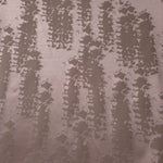 A wider cut of the mauve-rose animal print satin laid out, showing the full tonal repeat