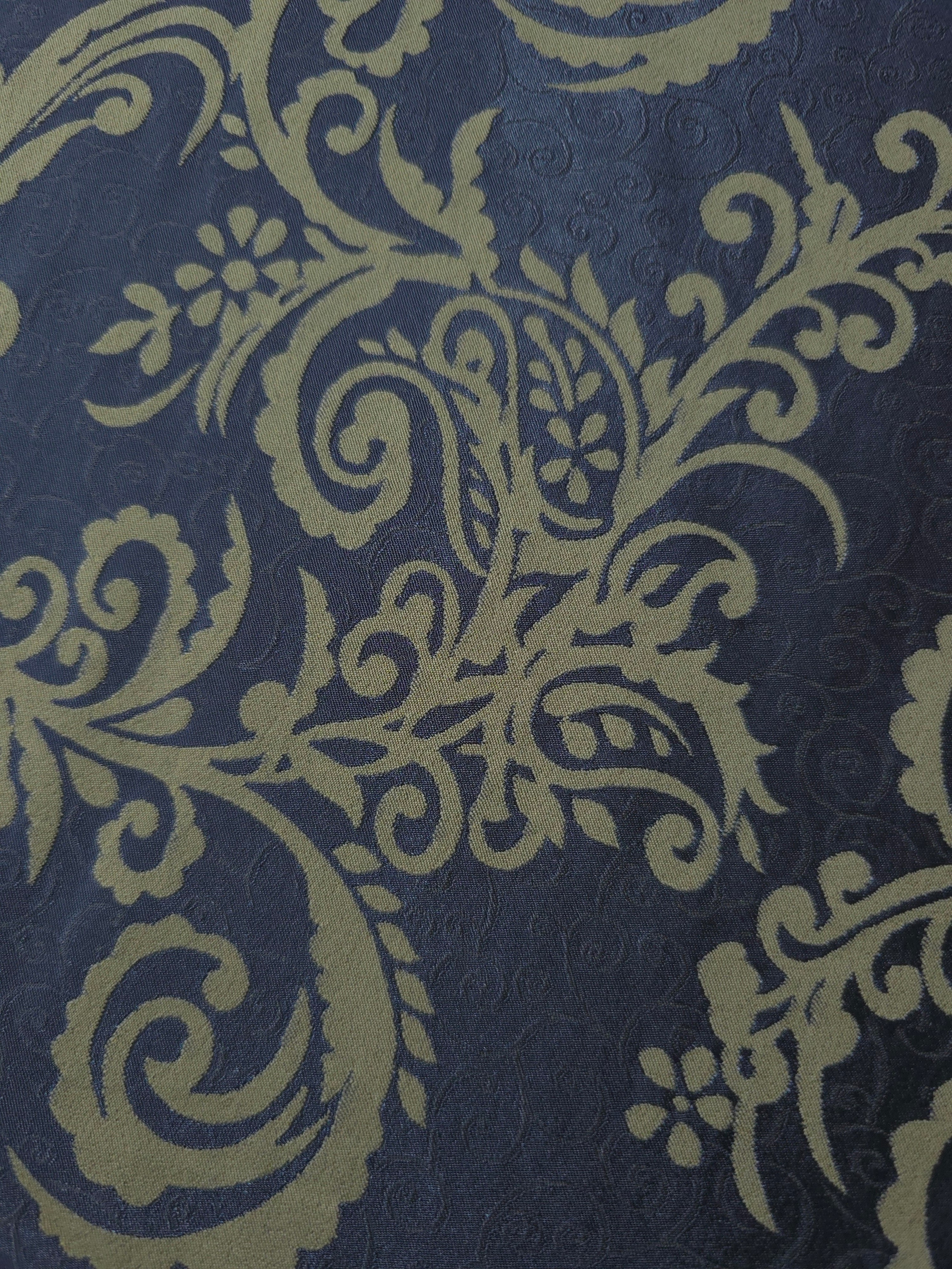 Close-up of the navy and olive-khaki baroque colorway, warmer in tone than the navy-and-grey version