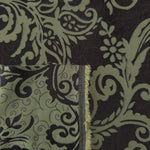 Front and back of the brown colorway, the glossy face far more saturated than its muted reverse