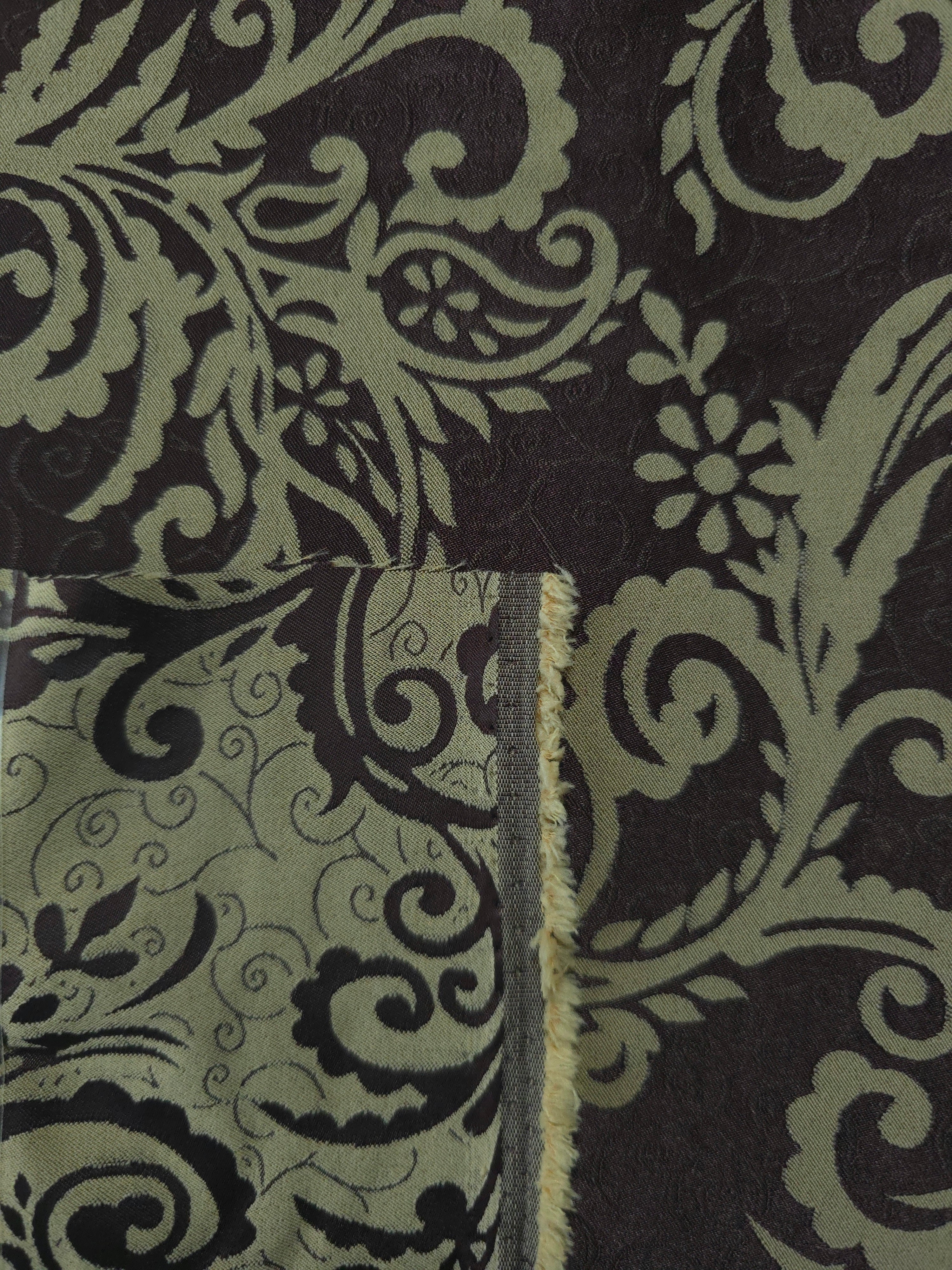 Front and back of the brown colorway, the glossy face far more saturated than its muted reverse