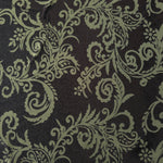 A wider cut of the brown and sage baroque satin, shown to see the full scale of the ornate motif