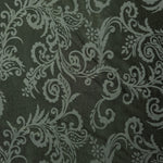 A wider view of the olive baroque satin laid flat, showing the full scroll pattern repeat
