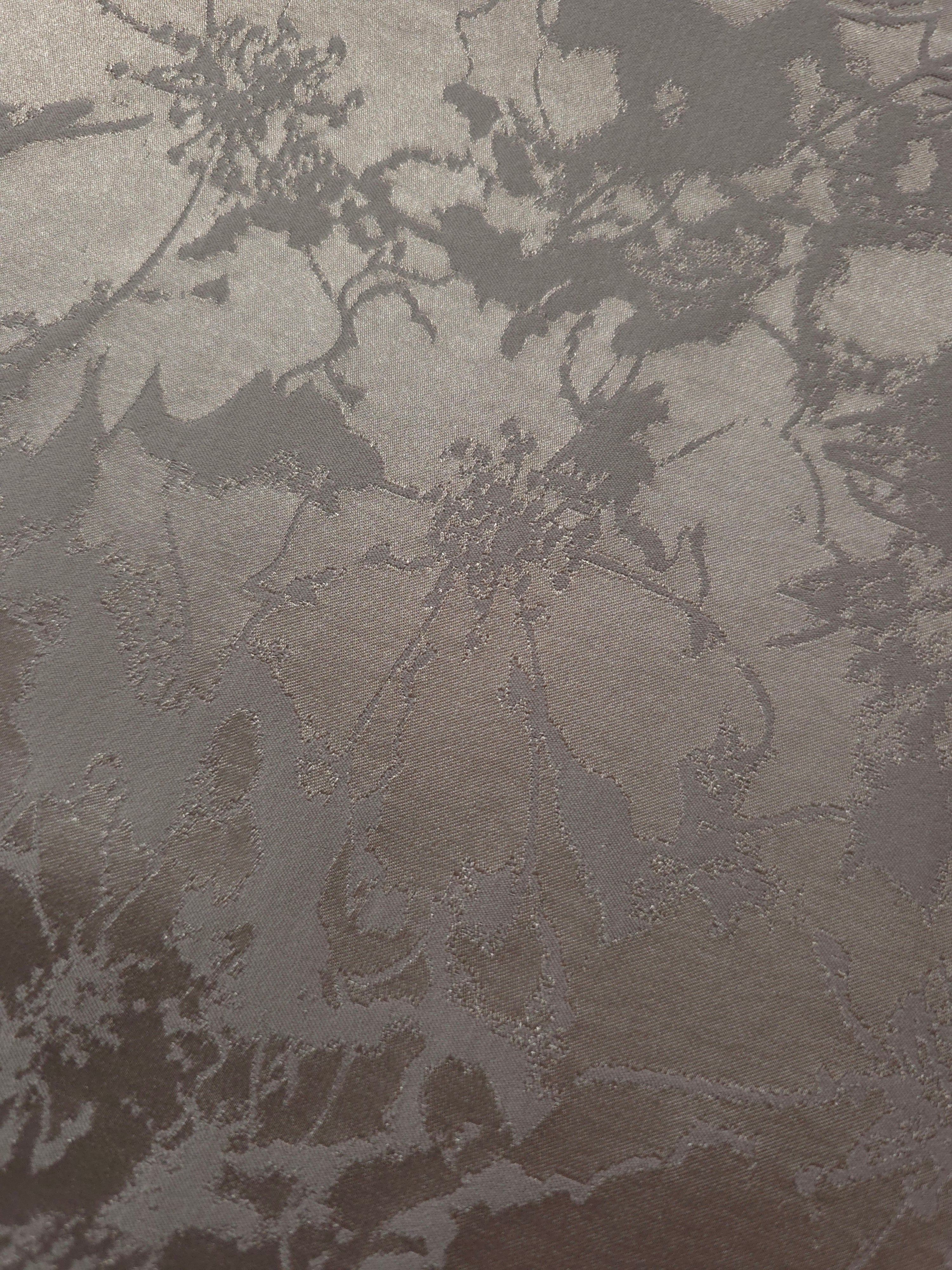 Close detail of the taupe floral colorway, suited to buyers wanting a quiet, intricate pattern over a bold one