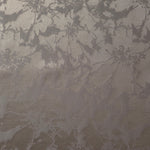 A wider view of the taupe floral satin, laid out to show the full intricate spray repeat