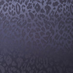 Wide view of leopard metallic motif woven jacquard fabric for dressmaking.