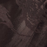 Close-up of dark brown metallic wave jacquard showing pattern-only shine.