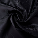 Draped alternate metallic wave jacquard with fluid movement for occasionwear.