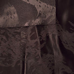 Front and back view of dark brown metallic wave jacquard for lining and texture checks.