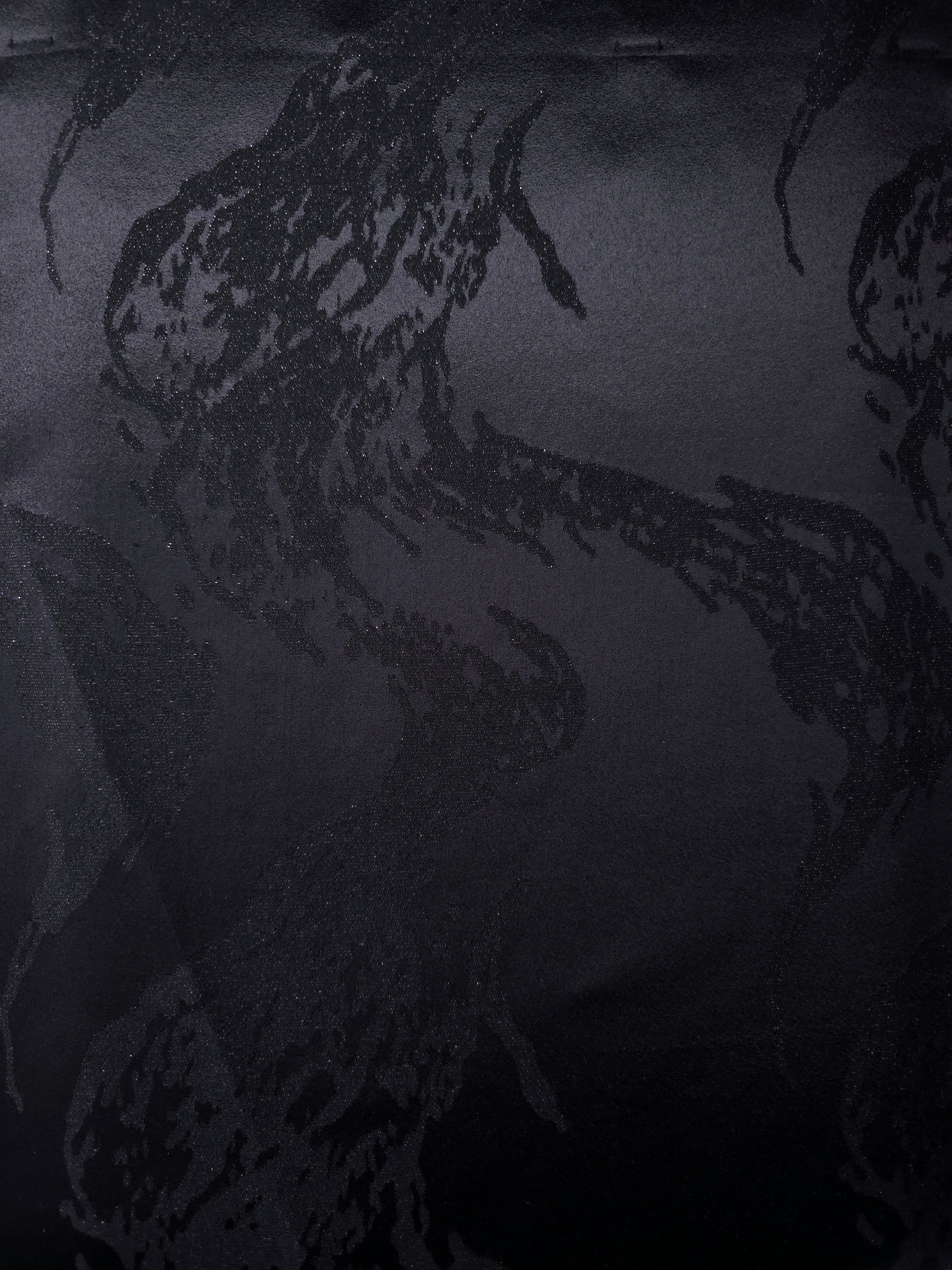 Wide view of alternate metallic wave motif jacquard fabric for dress and skirt panels.