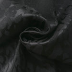 Draped zebra metallic motif woven jacquard with soft movement for skirts and dresses.