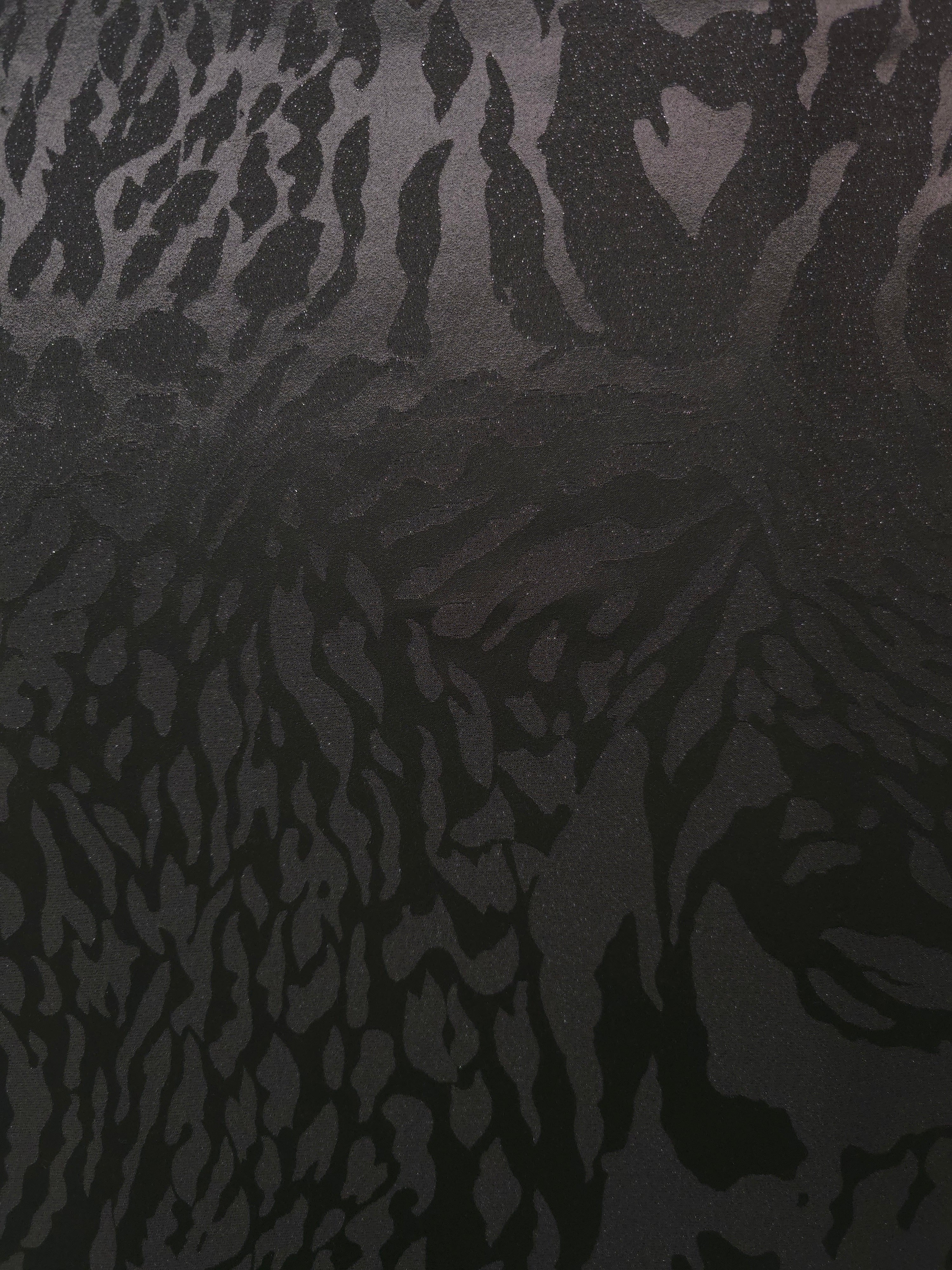 Wide view of zebra metallic motif woven jacquard fabric for statement dress panels.