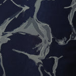 Close detail of the navy graphic line colorway, cooler in tone than the black version