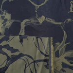 Front and back of the navy-charcoal colorway, the glossy face more saturated than its muted reverse