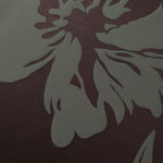 Close-up of the wine and sage hibiscus flower colorway, a large-scale bloom rather than a repeating small motif