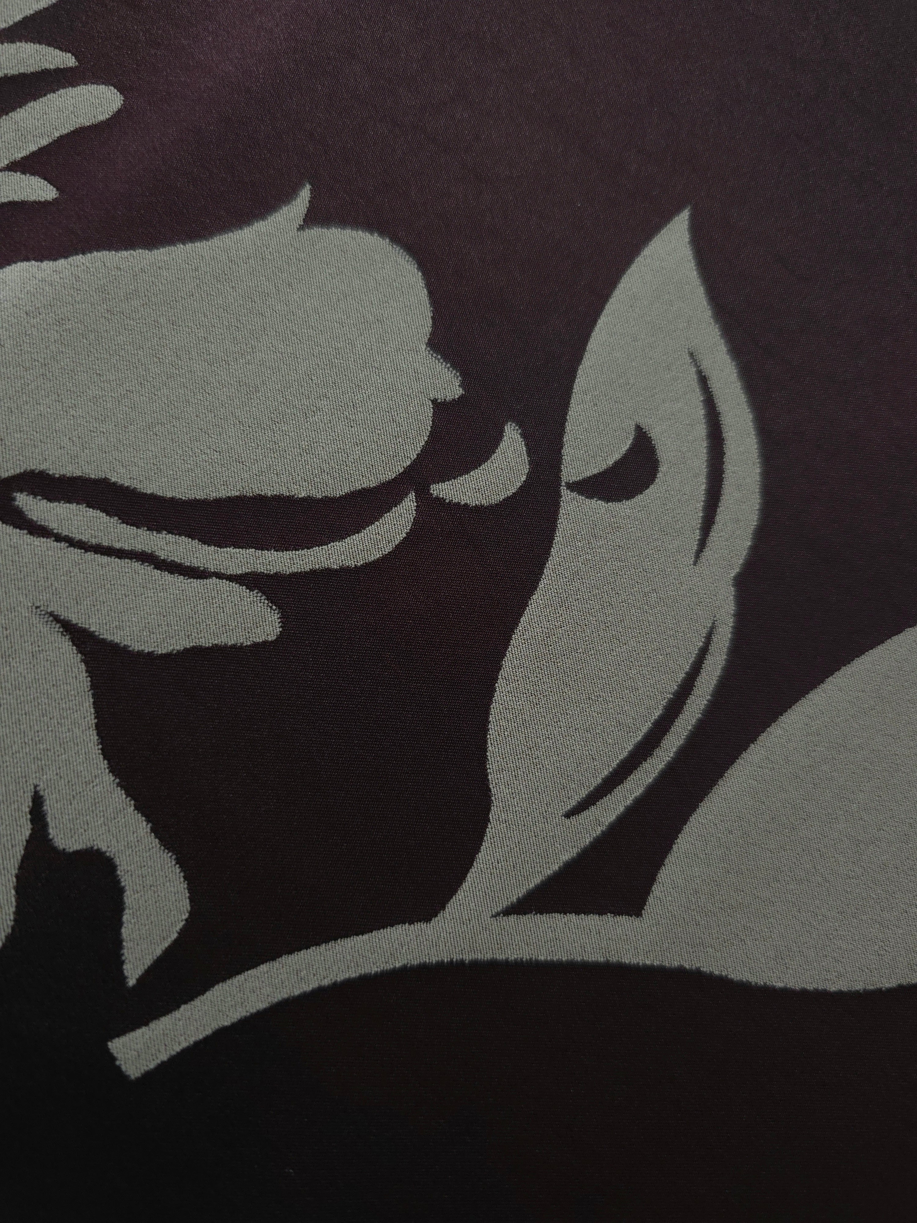 Close-up of the eggplant hibiscus flower colorway, cooler and darker in tone than the wine version