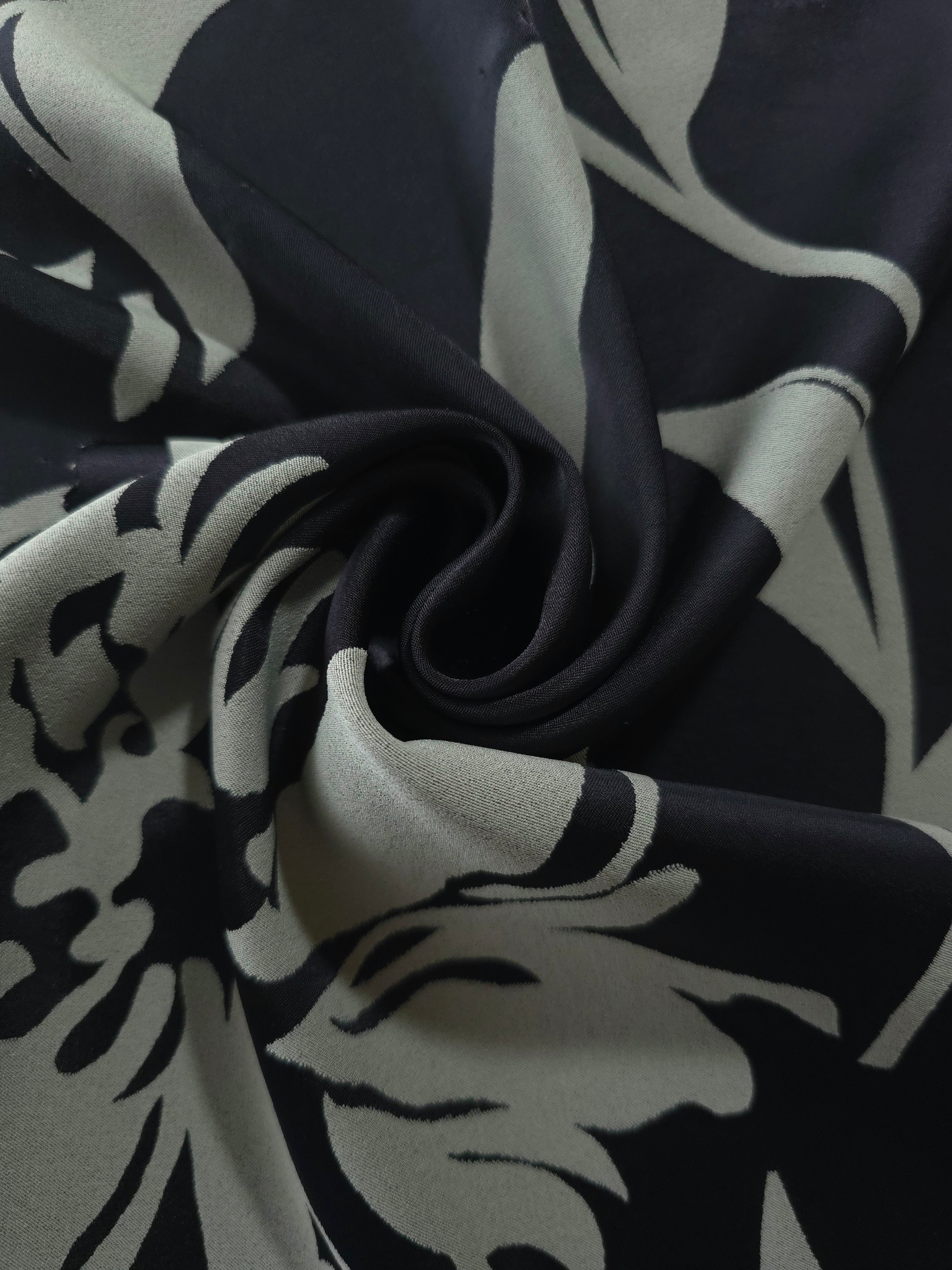 Black hibiscus flower satin draped loosely, suited to buyers wanting a graphic, statement-making floral