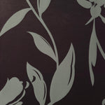 A wider section of the eggplant and sage hibiscus satin, shown to judge the bold floral pattern at scale