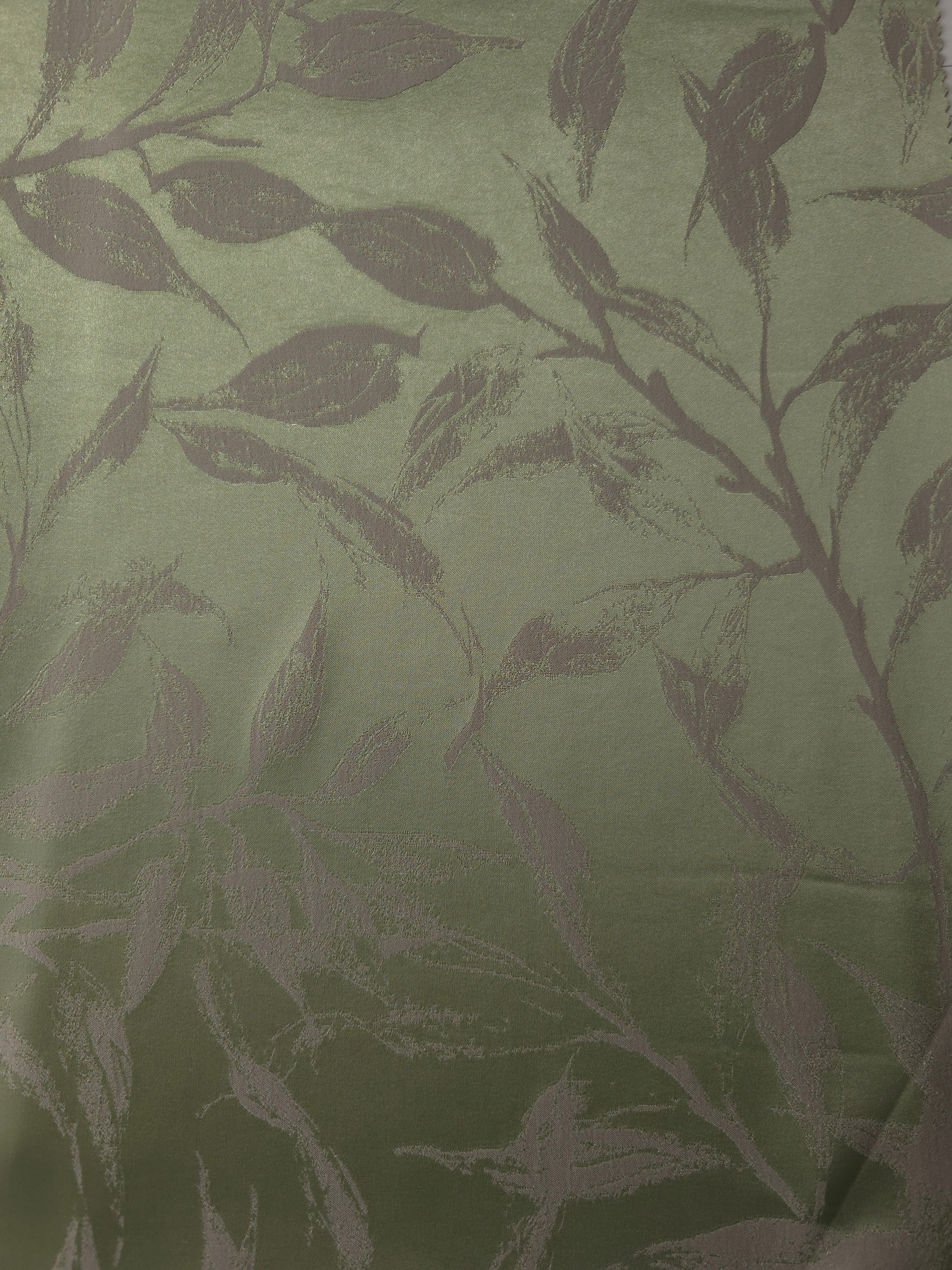 A wider view of the olive leaf satin laid flat, showing the full branching pattern repeat