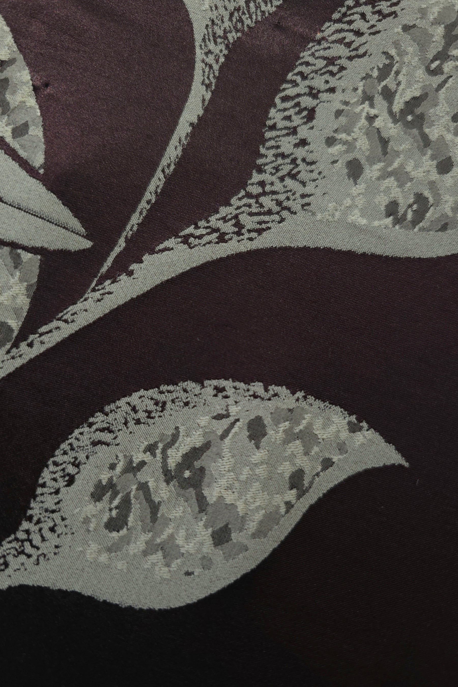 Close-up of the plum lily flower colorway, the darkest and most saturated of the three
