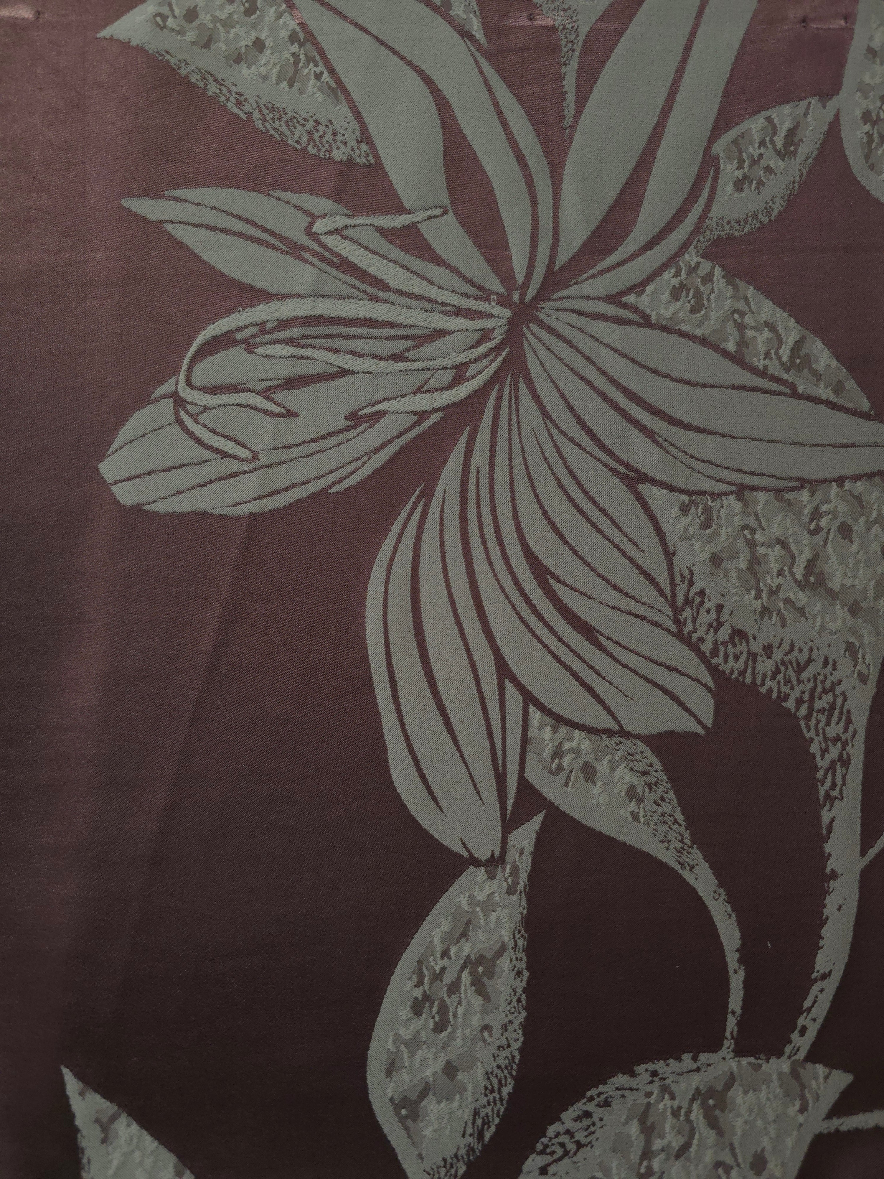 A wider cut of the maroon and sage lily flower satin, shown to see the full scale of the floral motif