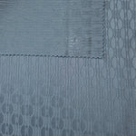 Front and reverse of the slate blue colorway, both sides close in tone with a subtle sheen shift