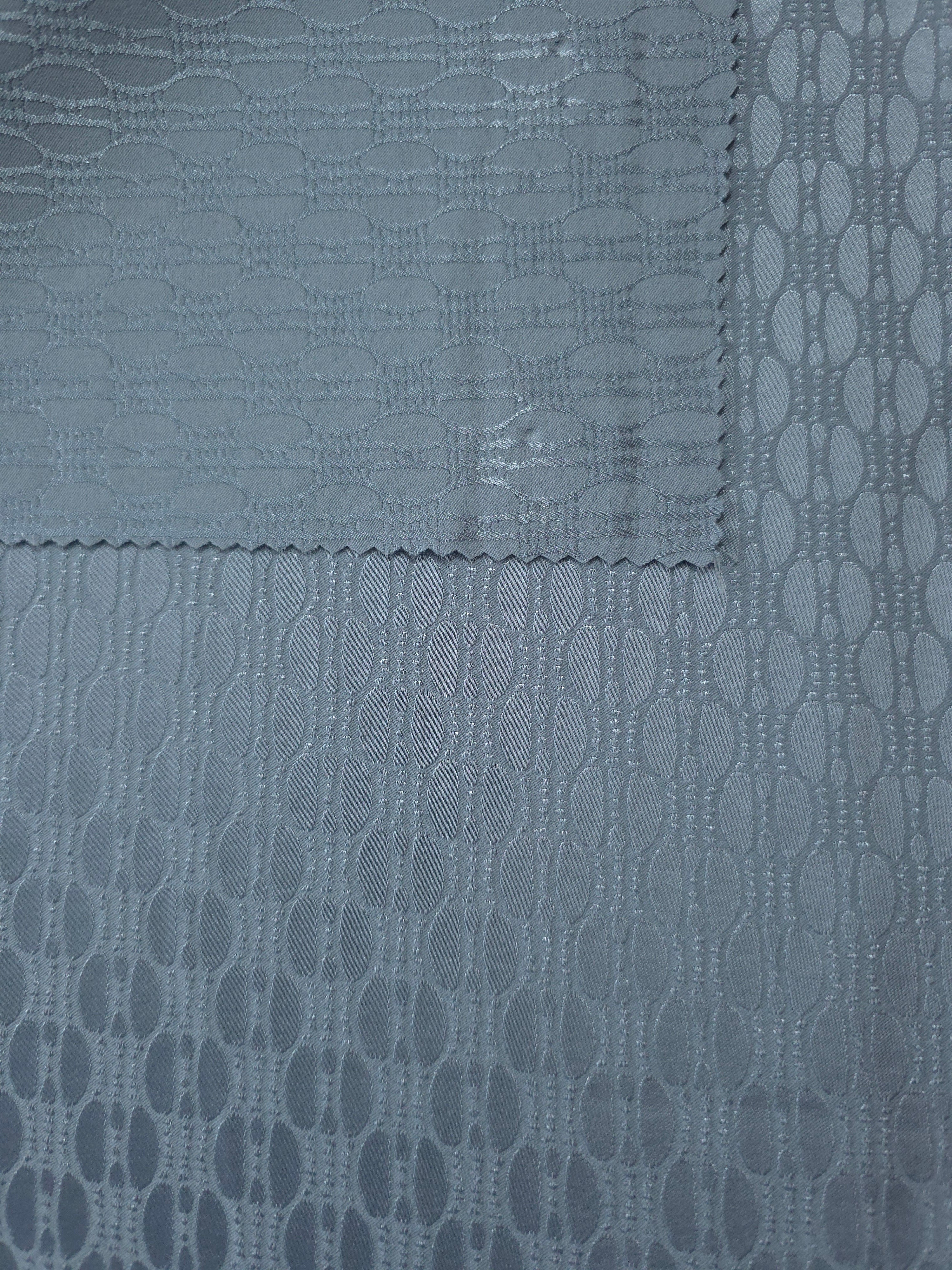 Front and reverse of the slate blue colorway, both sides close in tone with a subtle sheen shift