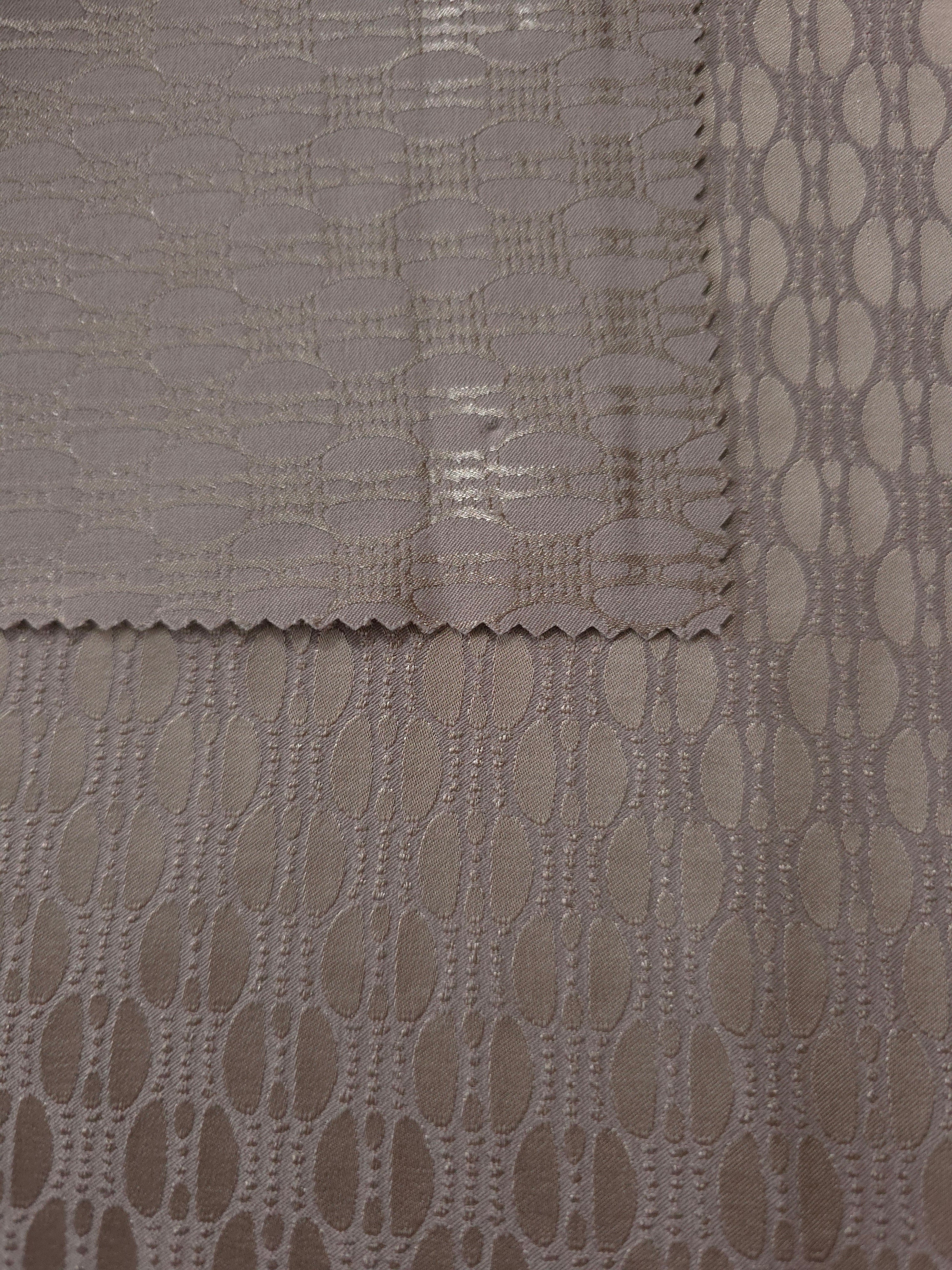 Taupe-bronze colorway shown front and back, the reverse settling into a slightly deeper brown