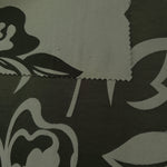 Forest green colorway shown front and back, the reverse settling into a quieter olive tone