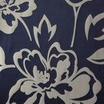 A wider section of the navy and silver pansy flower satin, shown to judge the bold floral pattern at scale