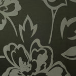 A wider view of the forest green pansy flower satin laid flat, showing the full floral repeat