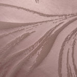 Close-up of the seaweed pattern woven into dusty rose stretch satin, visible mainly through sheen rather than color contrast