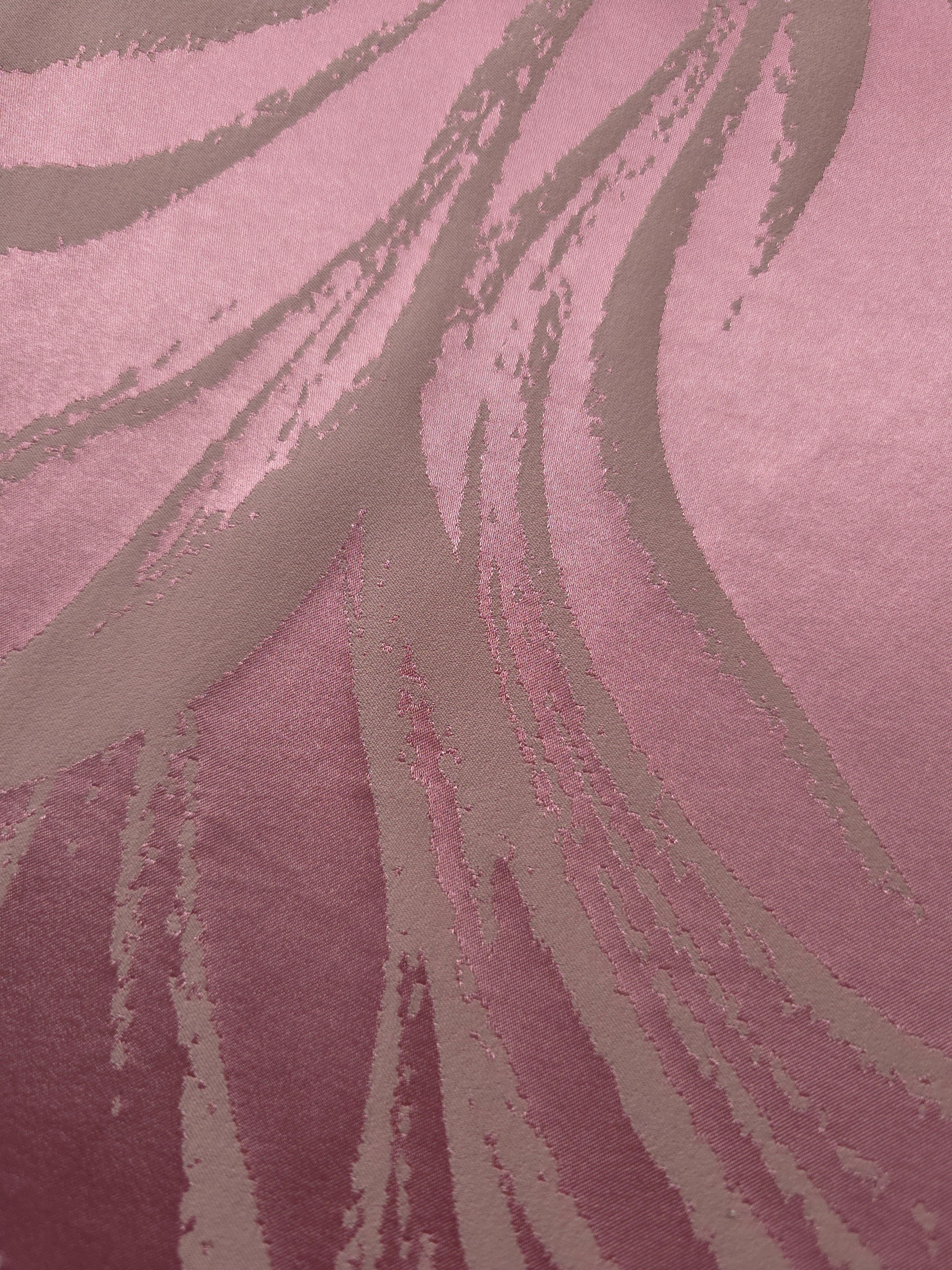 Close detail of the magenta colorway, where the contrast between bright pink and taupe is the most vivid of the six
