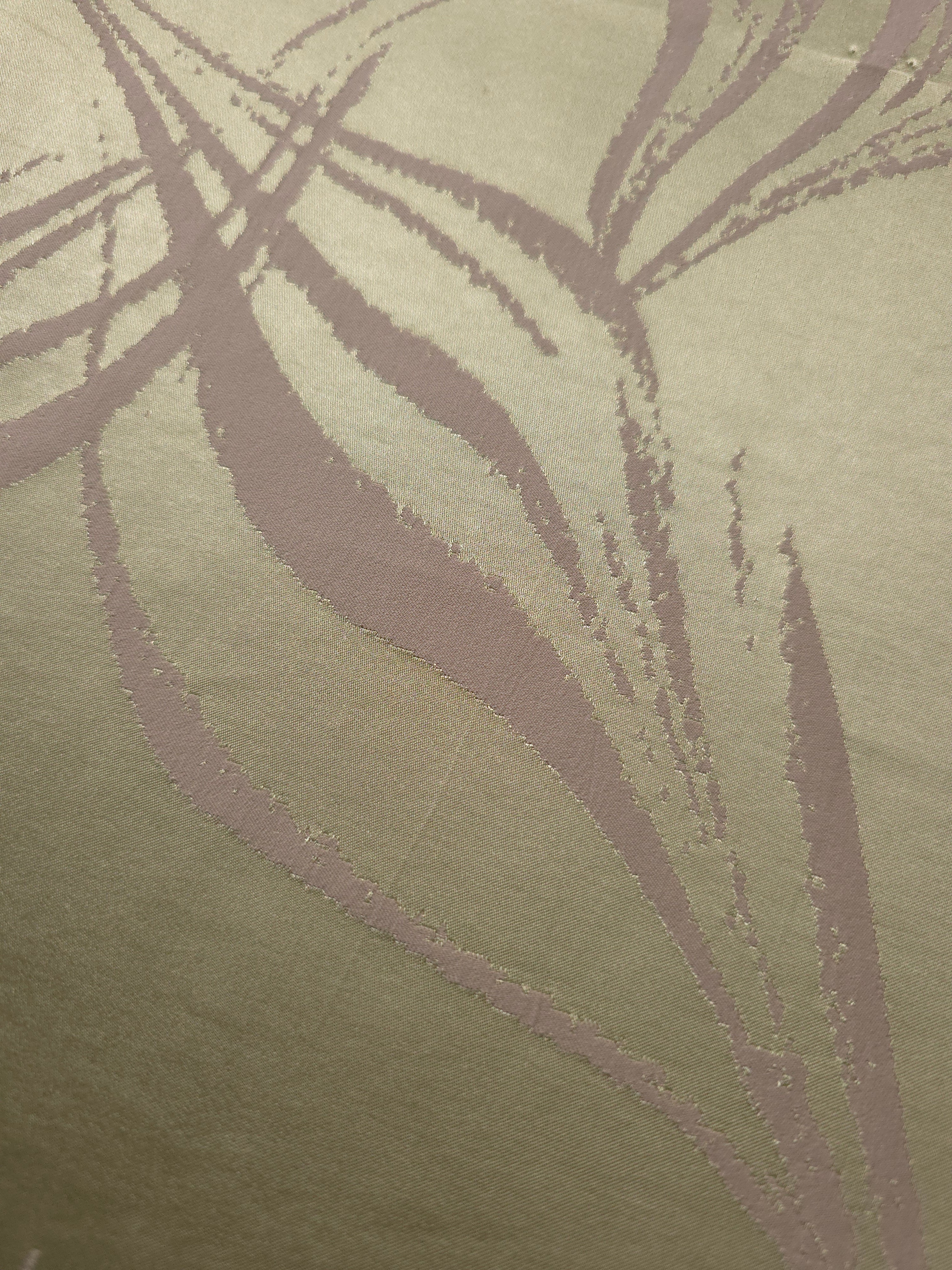 Close-up of the sage colorway, an earthier tone than the other five with warm mauve pattern lines