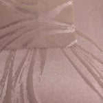 Both sides of the dusty rose Lassi satin side by side, showing the glossy face and its softer matte reverse
