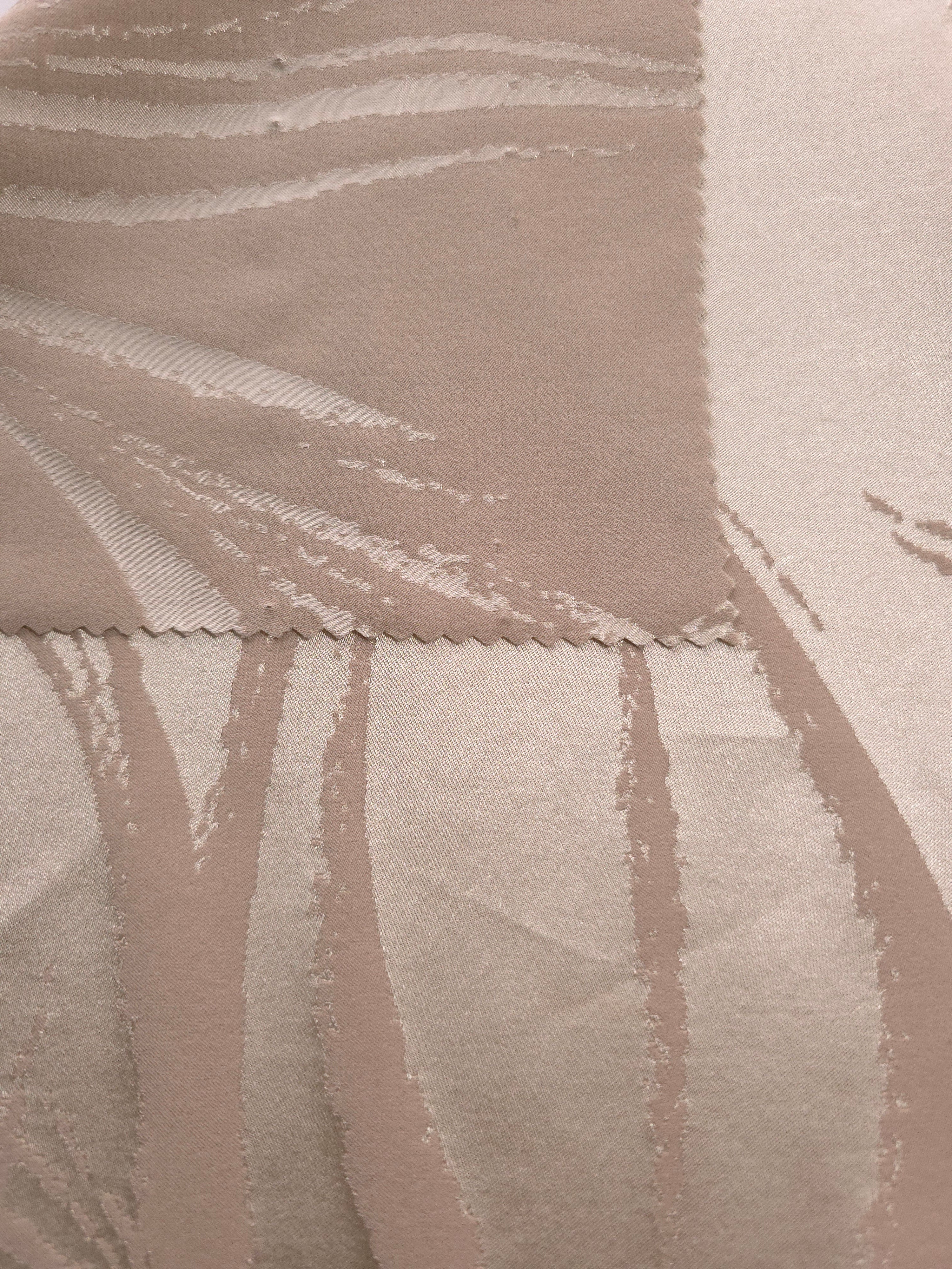 Champagne colorway shown front and back, both sides reading close to neutral with only a slight sheen difference