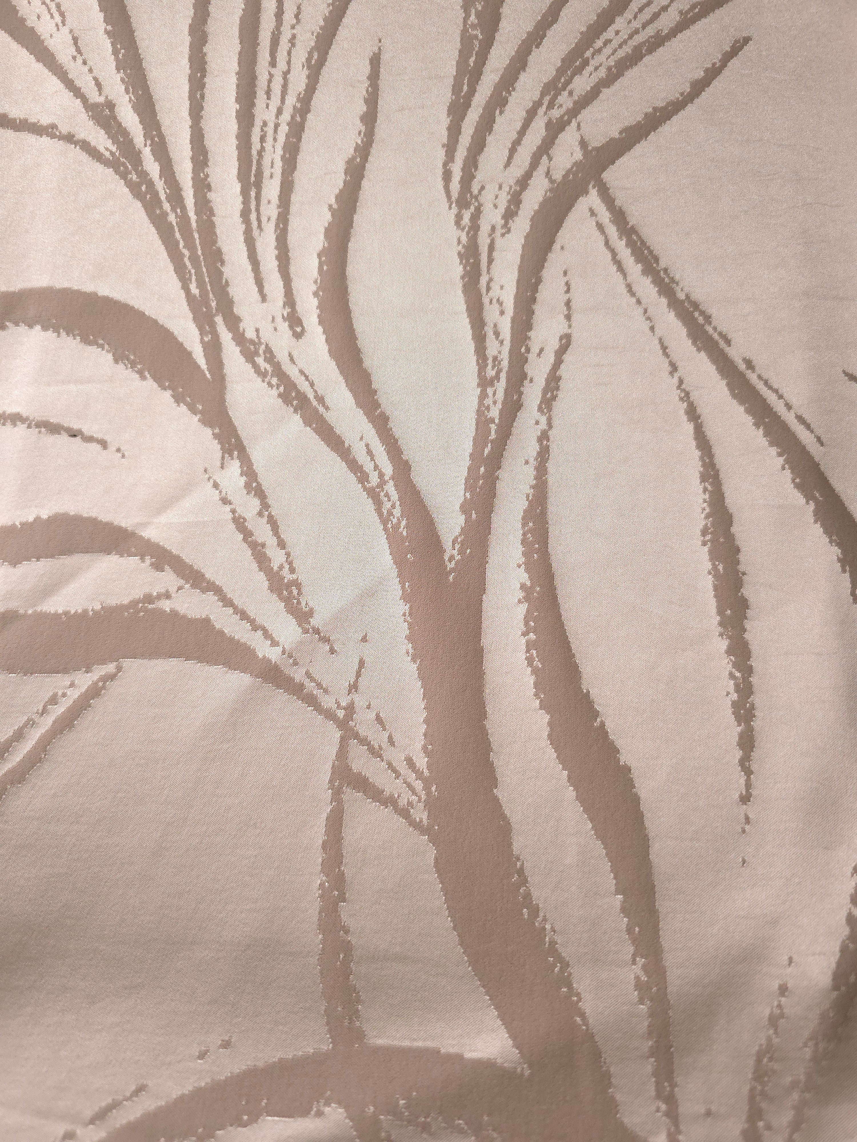 A wider cut of the champagne seaweed satin, laid flat to show the full tonal pattern repeat