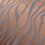 Close-up of the copper and blue-grey wave colorway, the same pairing shown in the main product photography for this fabric