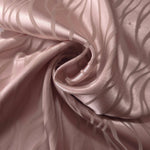 Mauve-plum Lassi satin draped loosely, suited to buyers wanting color depth without high contrast