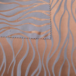 Front and reverse of the copper colorway, the back side settling into a quieter, more matte blue-grey