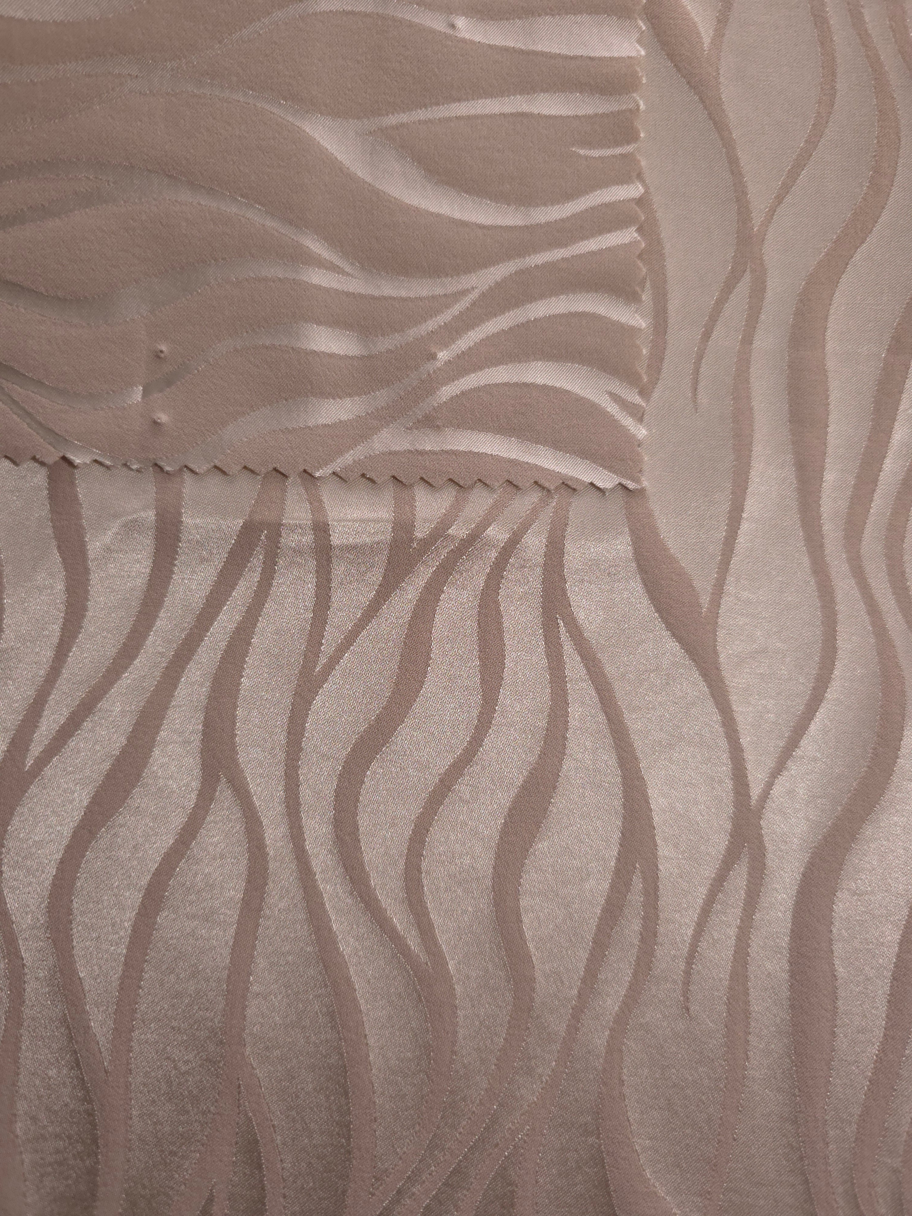 Taupe colorway shown front and back, both sides reading close in tone with only a slight sheen shift