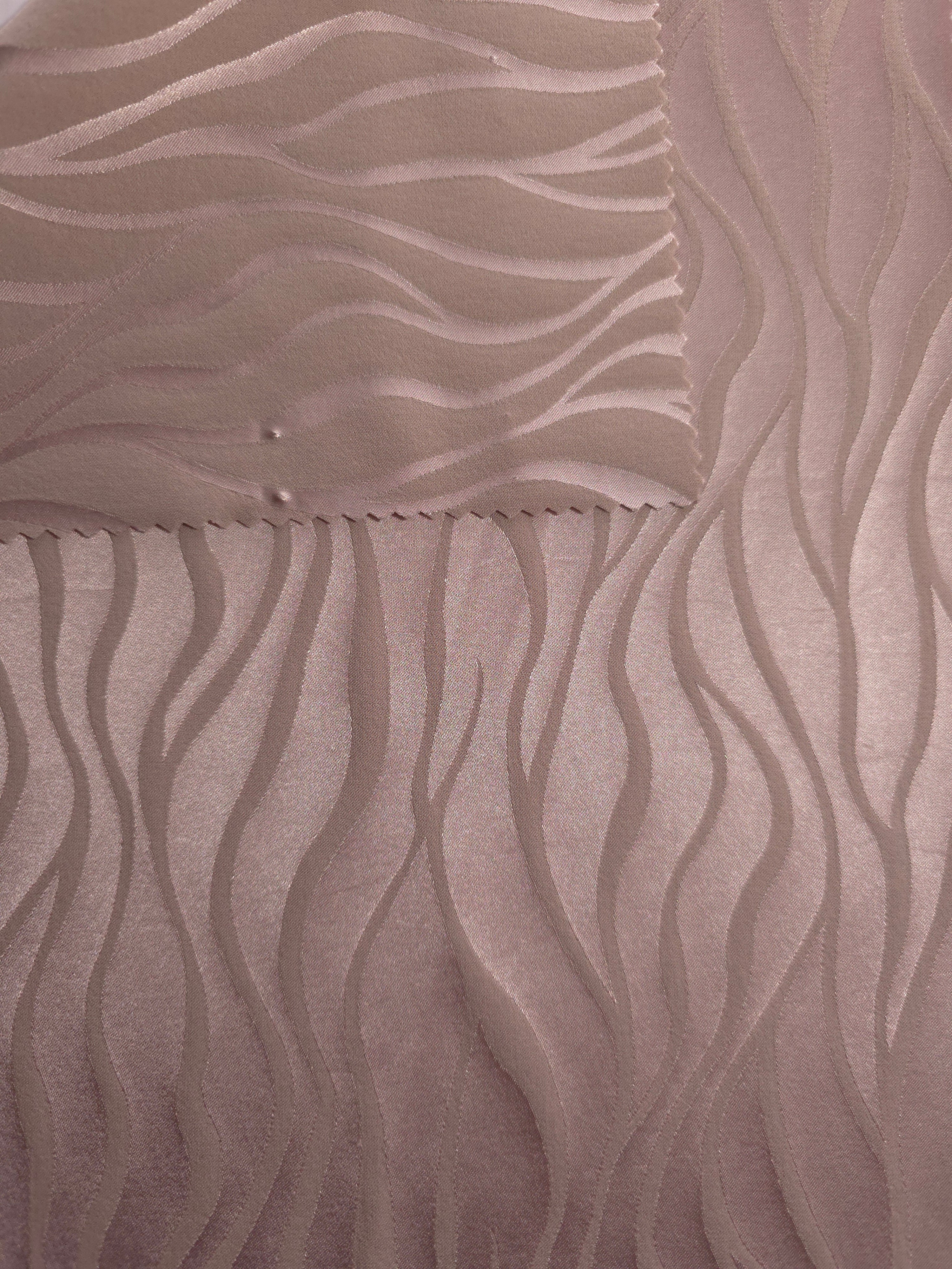 Front and reverse of the mauve-plum colorway, the back side leaning slightly cooler than the glossy face