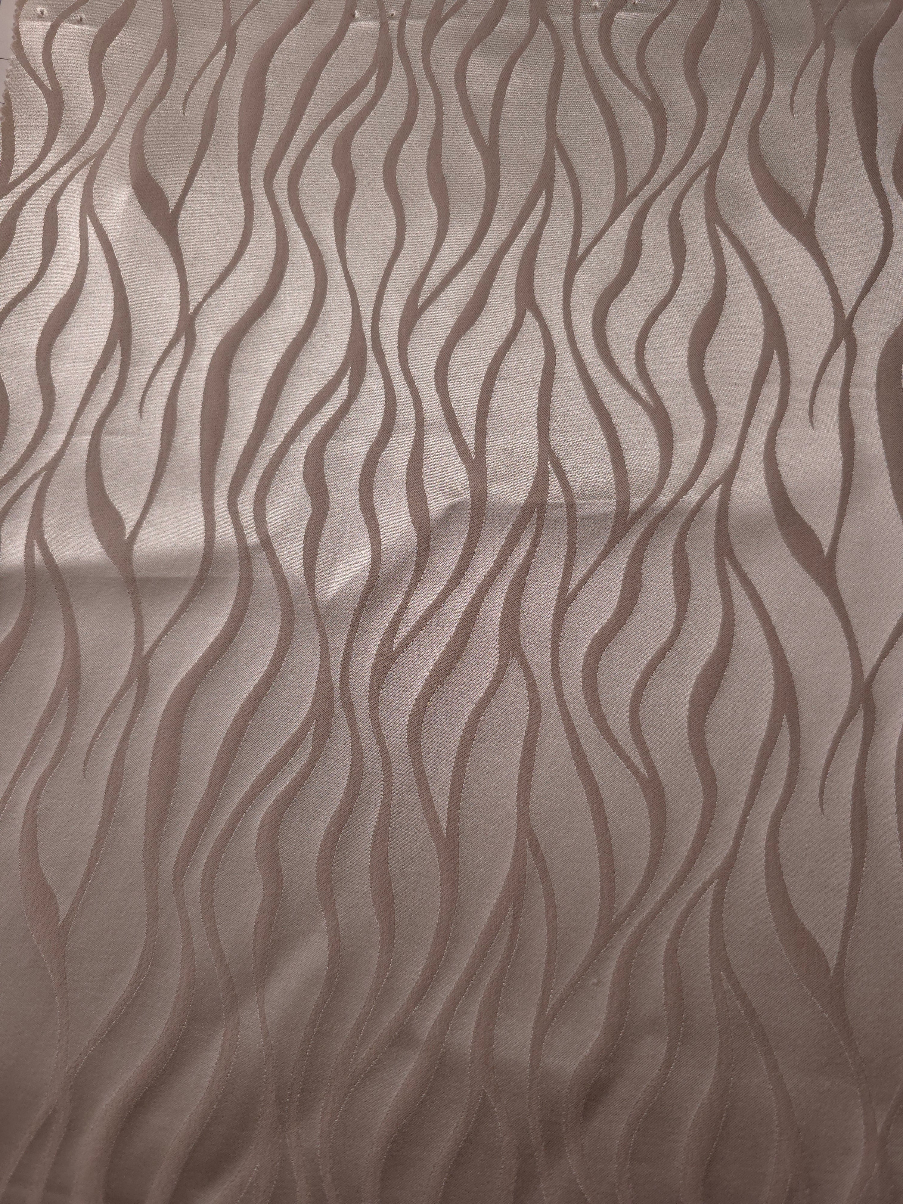 A wider view of the taupe wave satin laid flat, useful for seeing the full tonal pattern repeat