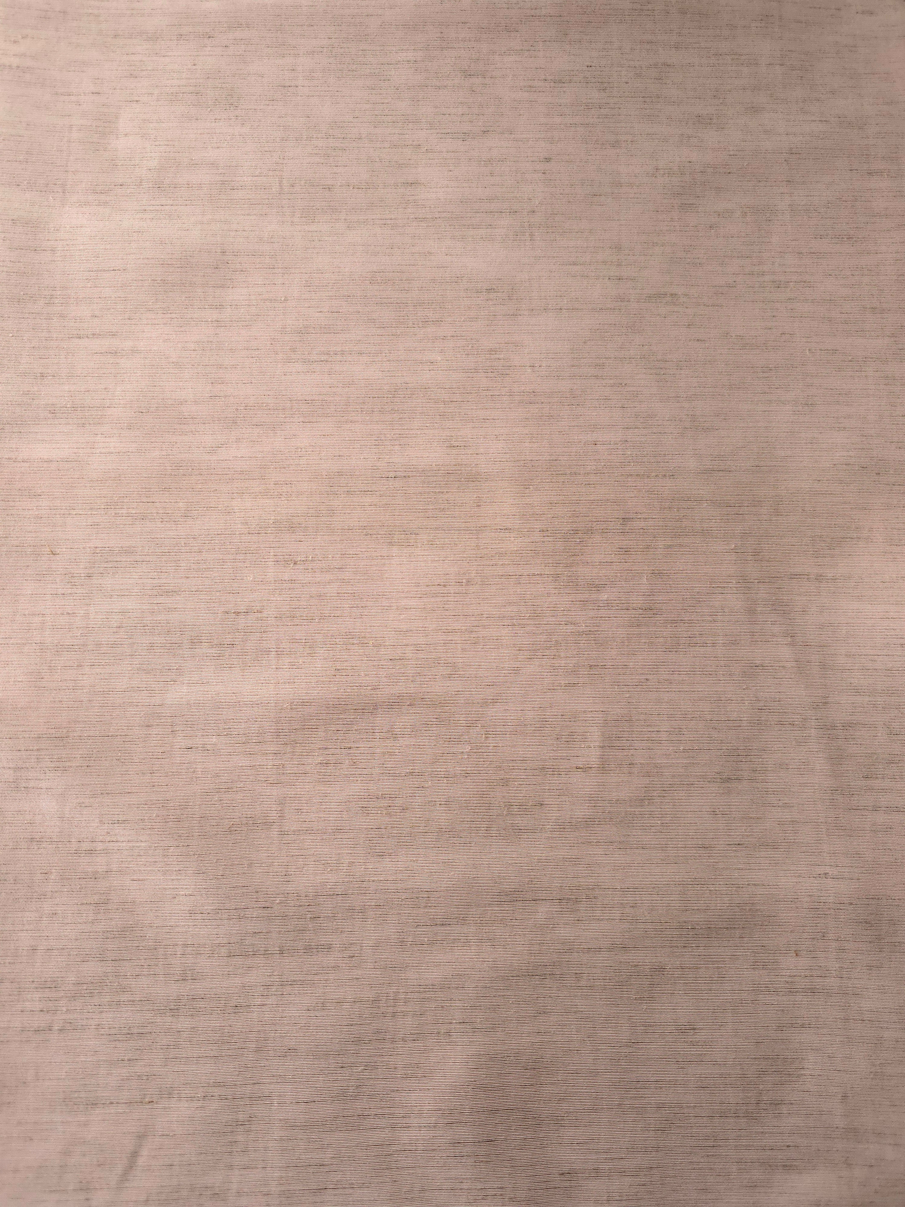 Soft dusty rose plain-weave linen viscose fabric, prized for its breathable hand and everyday apparel use.
